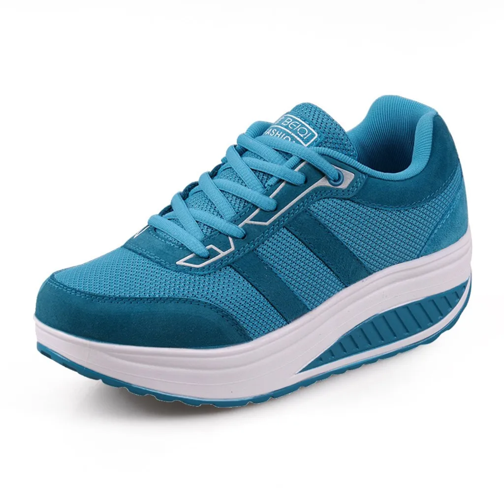 shoes with teal bottoms