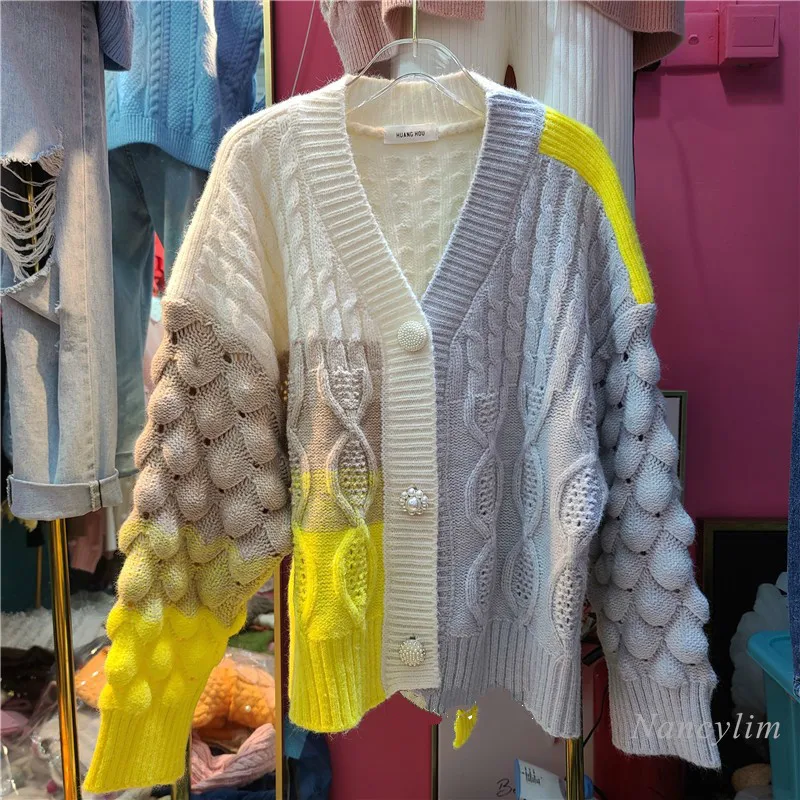 

2020 Autumn New Color Contrast Patchwork Asymmetric Hollow Knitted Cardigan for Woman Loose Pearl Button Jumper Femme