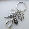 Fashion New Hand Fatima Wings Clover Good Luck Horseshoe Fish Bone Pendant Key Chain Ring Keychain Package Decoration Gift 1pcs ► Photo 3/5