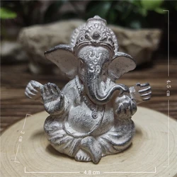Gold Ganesha Elephant God Statue - Elegant Home and Garden Decor Piece (White)