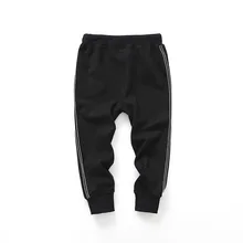 В году, новые стильные осенне-зимние детские брюки свободного кроя повседневные спортивные штаны для больших мальчиков мод мужчины и женщины дети сплошной коло