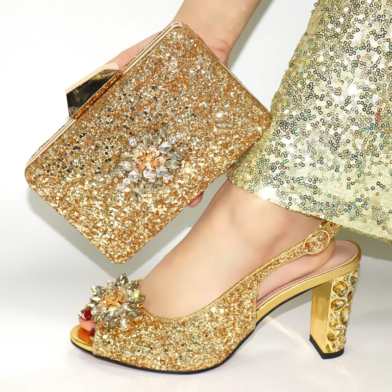 gold heels and clutch bag