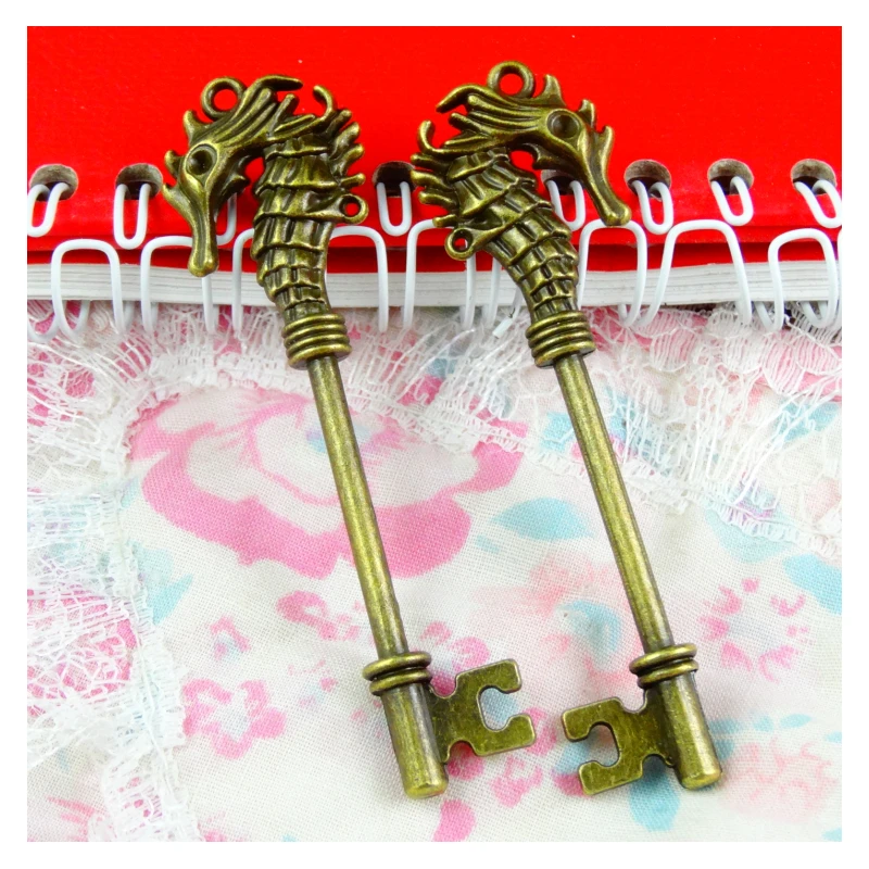 

Подвеска в виде ключа гиппокампа, покрытая бронзой, 72*20 мм, 10 шт.