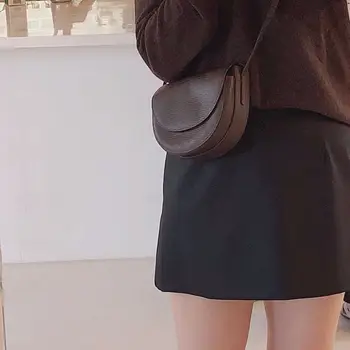 

Korean version semicircle saddle bag female 2020 autumn new insta web celebrity small black bag texture versatile with a cross