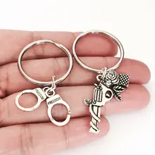 Европа и Америка импортные товары аксессуары пистолет Роза наручники сестры брелок одноклассники парный брелок