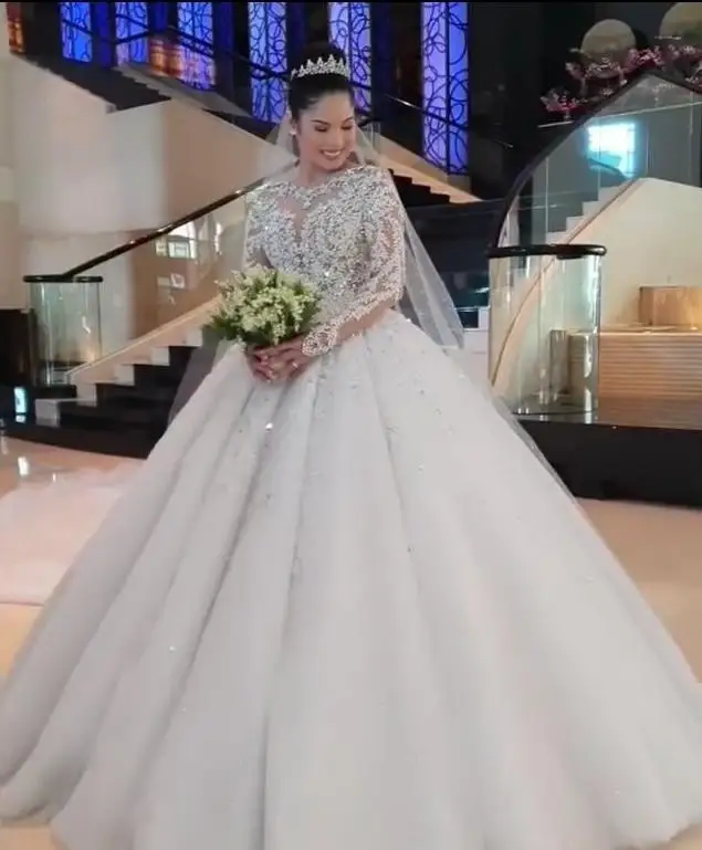 

Sparkle Illusion Wedding Dresses Crew Long Sleeves Sequined Lace Bridal Gowns Lace Appliques Train Vestidos De Novia