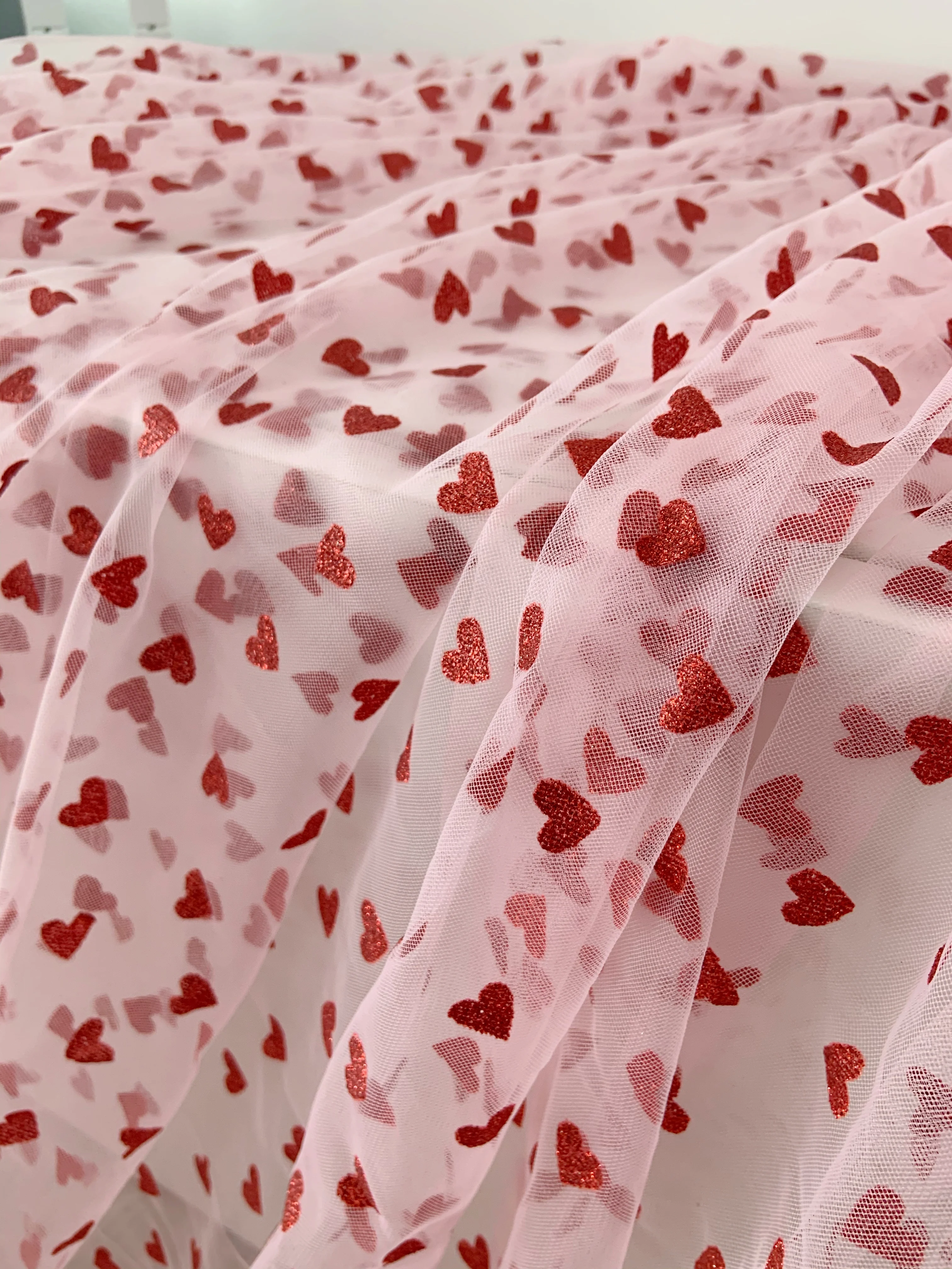 https://ae01.alicdn.com/kf/H798651bbb4824dca82b3c95167043a057/Pink-Gauze-Lace-Fabric-with-Sparkle-Red-Heart-Soft-Mesh-Tulle-for-Curtain-Couture-Dress-Wedding.jpg