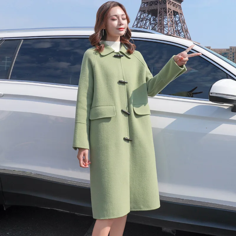 Woolen coat female long section winter new Korean version of the loose popular temperament trumpet buckle woolen