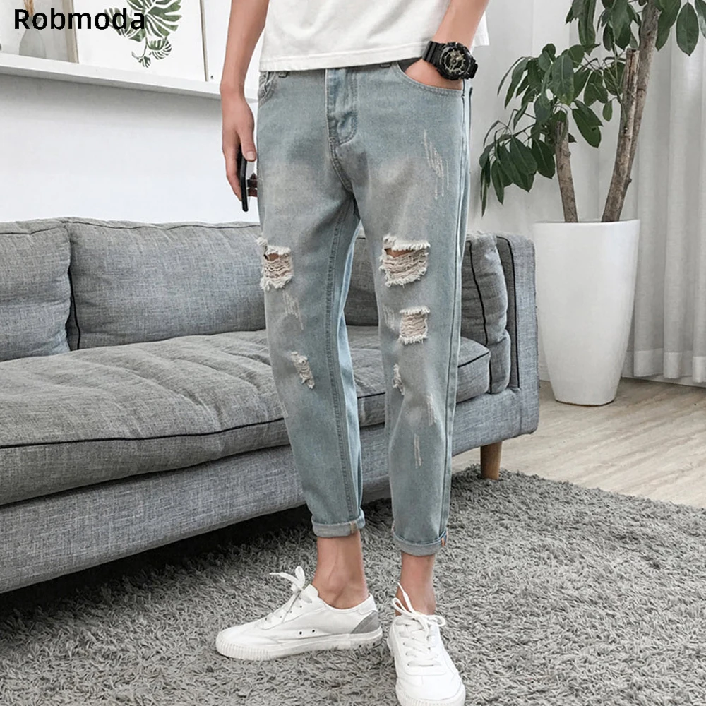 

Jeans men's pants spring and summer 2019 Korean version of the slim feet pants trend in the waist hole ankle length pants youth