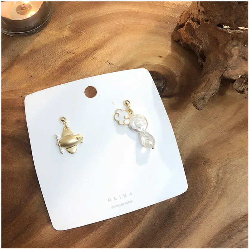 

Korea Cute Asymmetric Earrings Airplane Baroque Freshwater Pearl Earrings Crystal Transparent Stud Earrings Female Ear Ring 2019