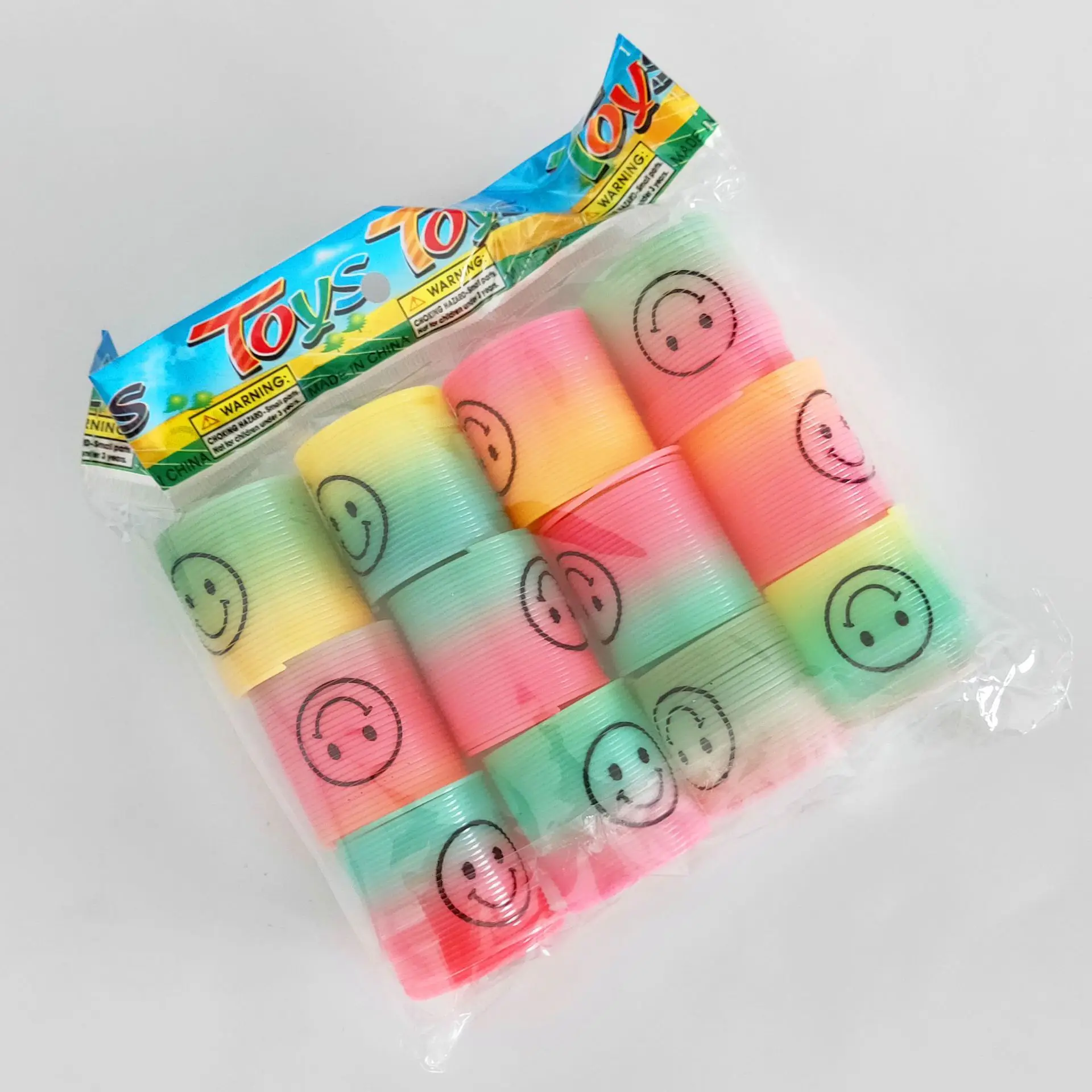 Ground Promotion Small Gift Smiley Spring Rainbow Ring Rainbow Tower Creative Children'S Educational Toy Gift 12 a Bag