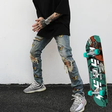 Pantalones vaqueros rasgados de estilo hip hop para hombre, jeans ajustados con bordado de mariposas y agujeros, 2021