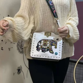 

Free shipping female bag elephant embroidery new wide shoulder strap messenger small bag wild casual lock bag female
