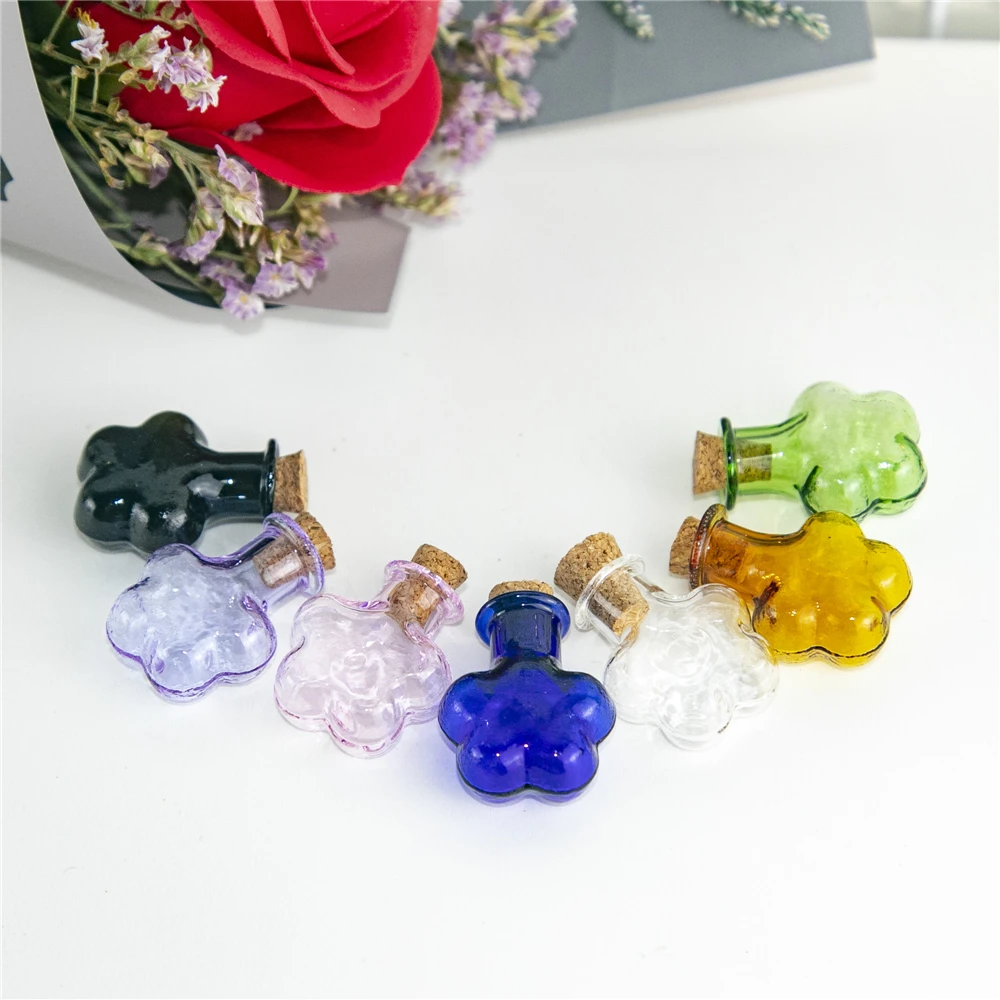 

7Pcs 2ml of Small Plum Blossom Shape Glass Ornaments with Different Colors and Art Craft Vials Travel Sub Bottle Trinket Pendant