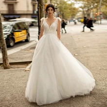 

2022 Tulle Boho Wedding Dress Princess V-Neck A-Line Lace Appliques Spaghetti Straps With Bow Backless Bridal Gown Custom Made