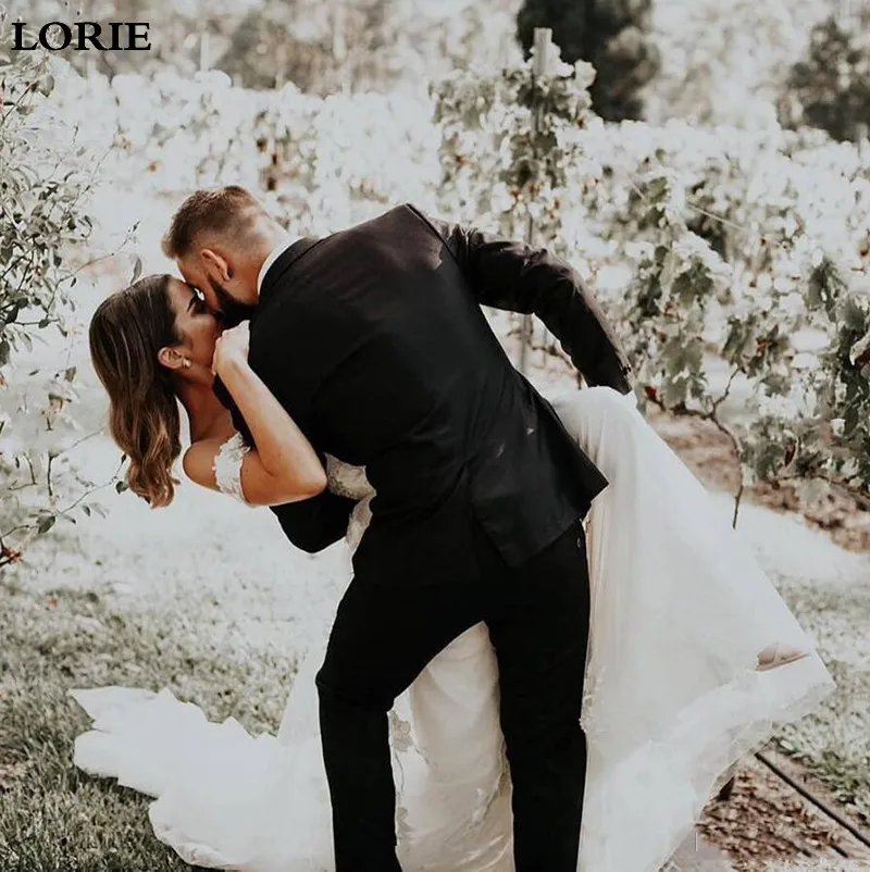 graceful-lace-appliques-off-shoulder-wedding-dresses-backless-tulle-a-line-boho-beach-plus-size-wedding-gowns-robes-de-mariée (4)