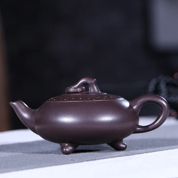 

LingYanQin recommended manual undressed ore purple clay three-legged yuhuan 140 cc are recommended