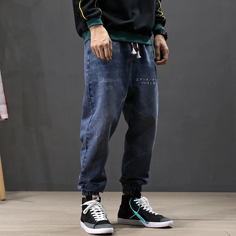 

Japanese Style Fashion Men Jeans Blue Color Loose Fit Printed Designer Harem Jeans Men Elastic Waist Hip Hop Jogger Jeans Homme
