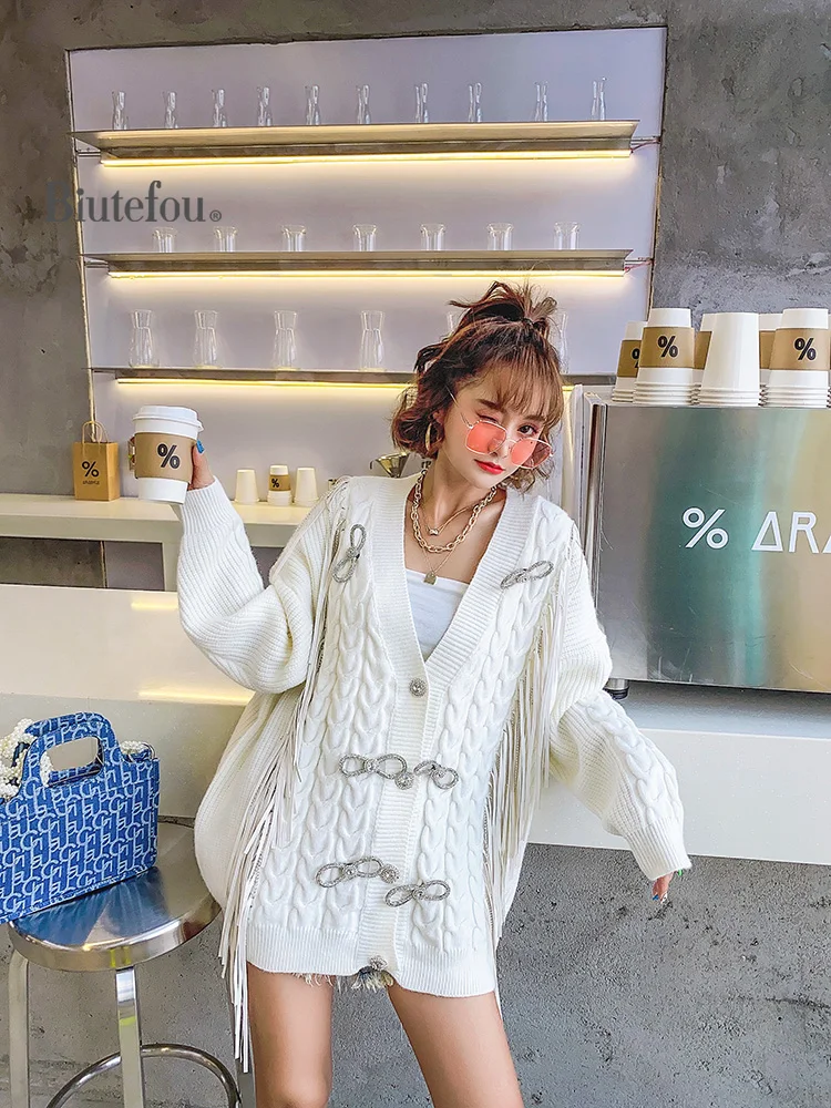 

2020 Autumn and winter knitted jackets women sequins bow tassel long sleeve jackets