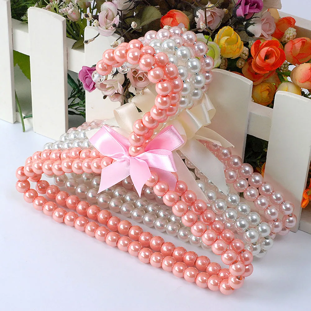 

Plastic Pearl Bow Clothes Hanger For Kids Children Pet Dog Cat Clothing Save-Space Storage Organizer Dry Rack