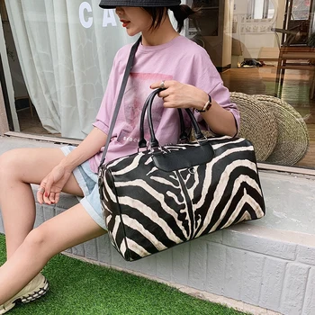 

YILIAN The new fashion zebra-print one-shoulder travel bag in 2020 has a large capacity and a light luxury handbag for women
