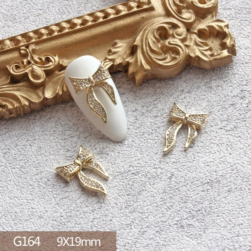 10 개/몫 3D 활 나비 사랑 합금 네일 아트 지 르 콘 진주 금속 매니큐어 손톱 Accesorios 용품 DIY 네일 장식 매력