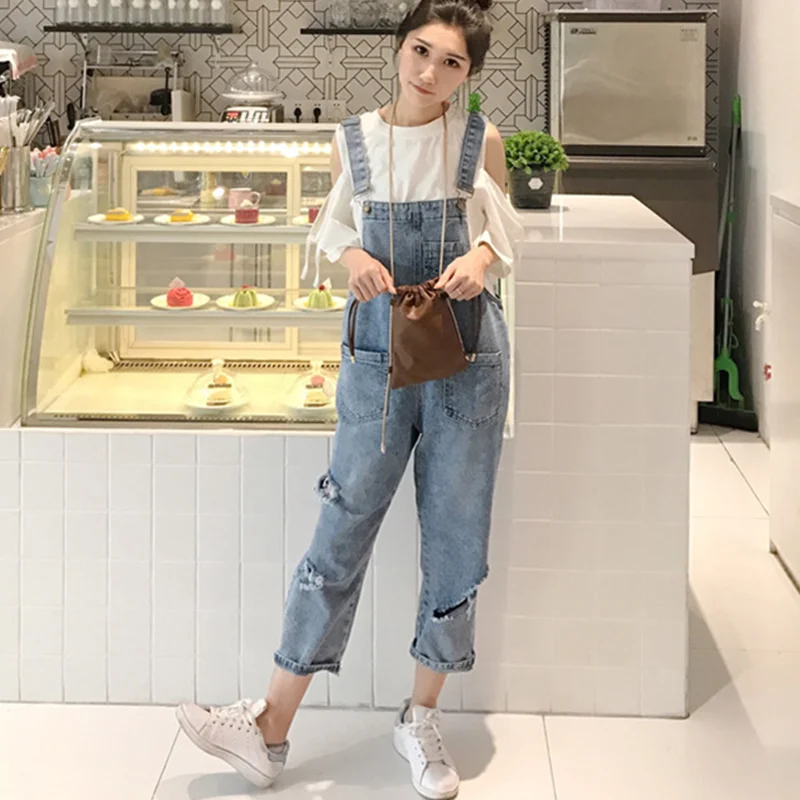 

Spring, summer, autumn and winter tattered loose denim women's pants new high waist fashion suspender hook jumpsuit