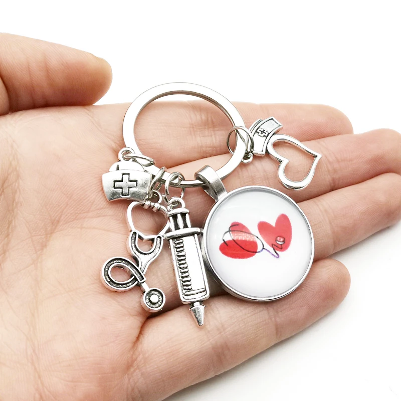 

New fashion creative nurse medical syringe stethoscope image keychain glass cabochon and glass dome key ring pendant gift