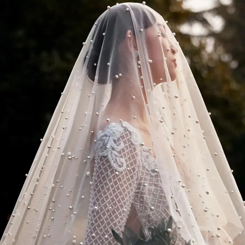https://ae01.alicdn.com/kf/H7ad35f31fb35433caa8fcfa619b5a202x/Voile-Mariage-3M-Long-Pearls-Bridal-Veil-NO-Comb-One-Layer-Cathedral-Wedding-Veils-with-Crystal.jpg
