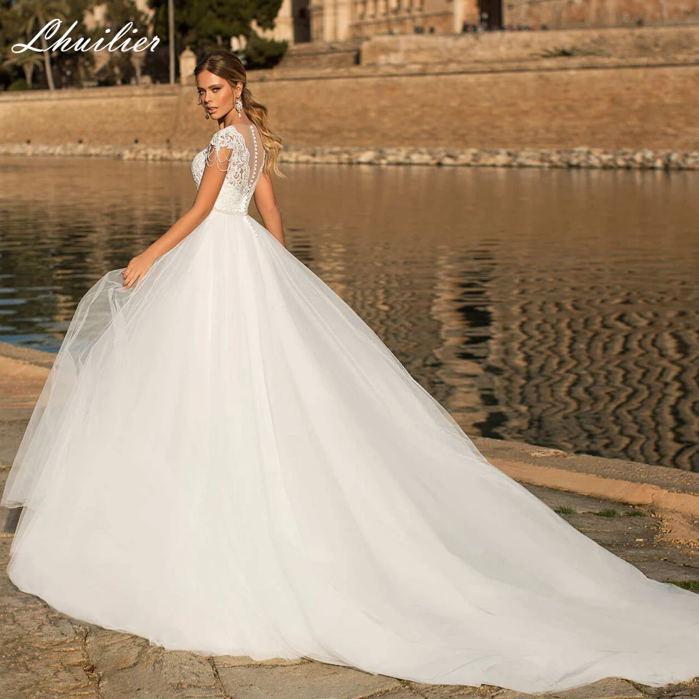 

Lhuilier V Neck A Line Tulle Wedding Dresses Floor Length Cap Sleeves Lace Appliques Bridal Dress with Beading Belt