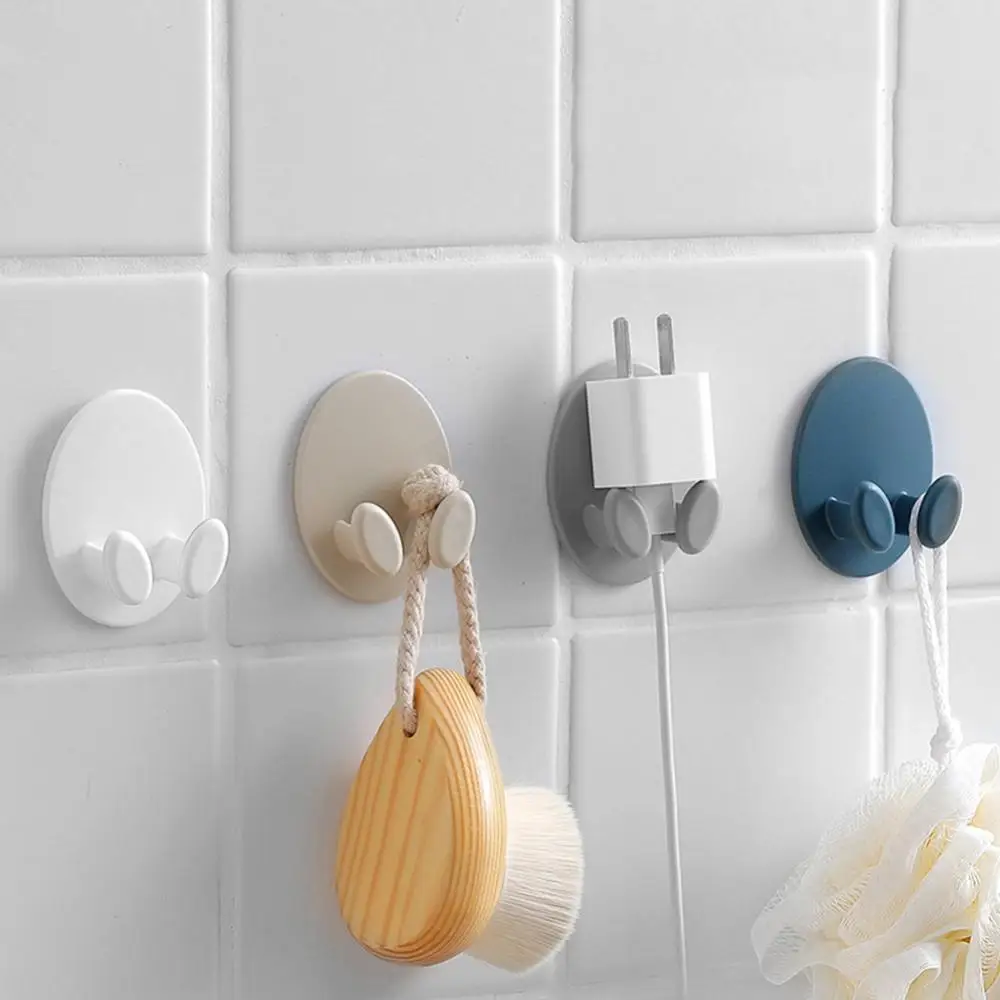 2Pcs Wall Mount Adhesive Power Plug Socket Hook Rack Holder Home Office Hanger |