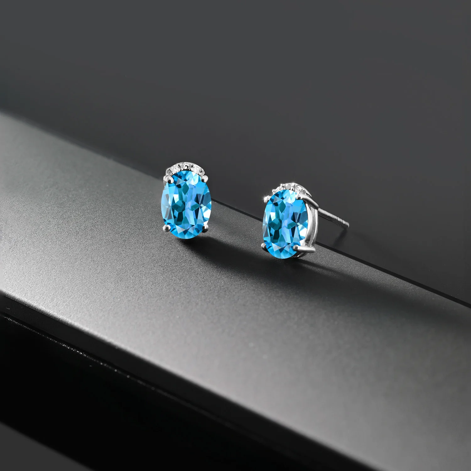 Серьги гвоздики GemStoneKing 1 73 карат Овальные натуральный голубой топаз белый