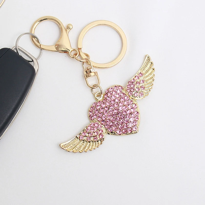 Новая мода в форме сердца крылья Ангела Брелки для женщин милый брелок про путешествия на сумку Розовый циркон золотой брелок Прямая поставка