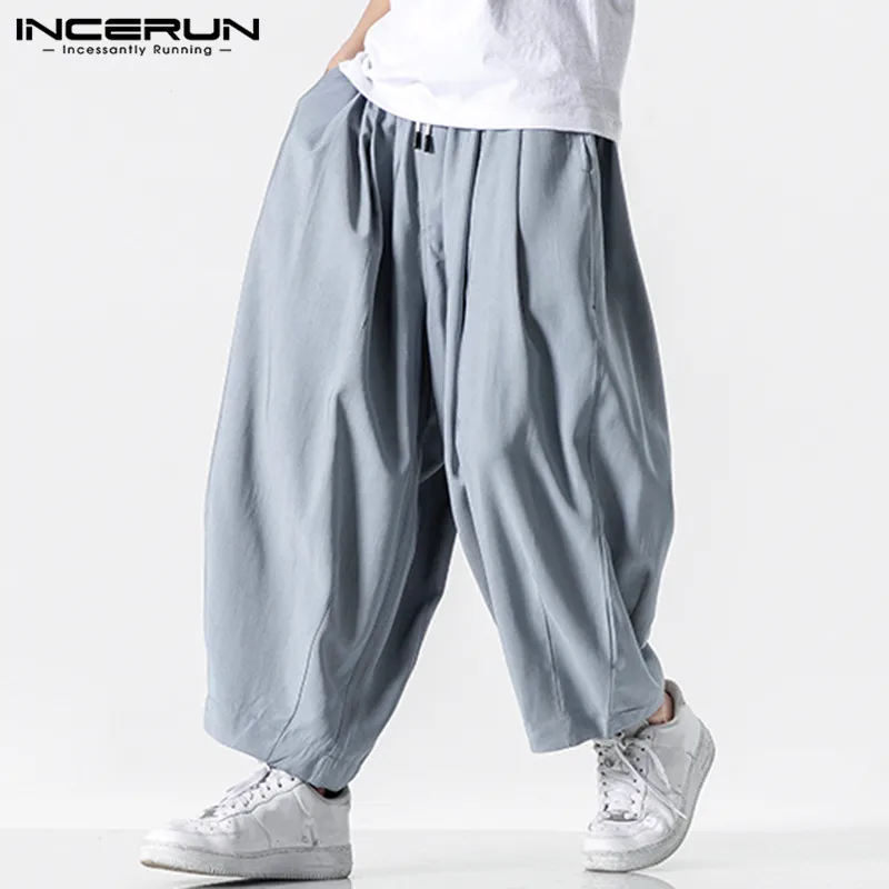 Men Wide Leg Pants 2020 Drawstring Joggers Plain Pockets High Street Casual Trousers Men Baggy Fashion Harem Pants INCERUN S-5XL Men Wide Leg Pants 2020 Drawstring Joggers Plain Pockets High Street Casual Trousers Men Baggy Fashion Harem Pants INCERUN S-5XL