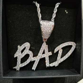 

AurolaCo Hip Hop Custom Name Necklace Cursive Writing Initial Gold Chain Letters Pendant Zircon Necklace Jewelry For Women