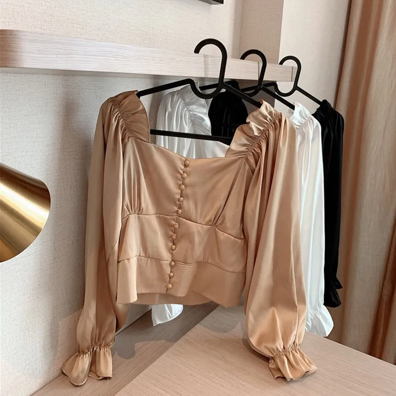  MUMUZI shirt female design sense court wind satin super fairy blouse leak clavicle single-breasted 