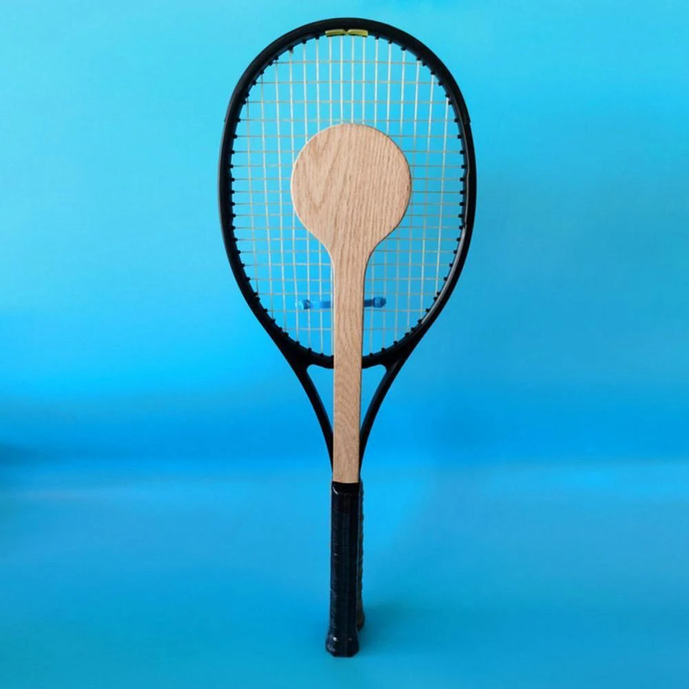 raquette de tennis en bois