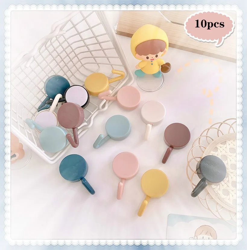 10 unids/set de ganchos de Color sólido para puerta sin perforaciones, gancho pequeño para ropa, ganchos de pared decorativos montados