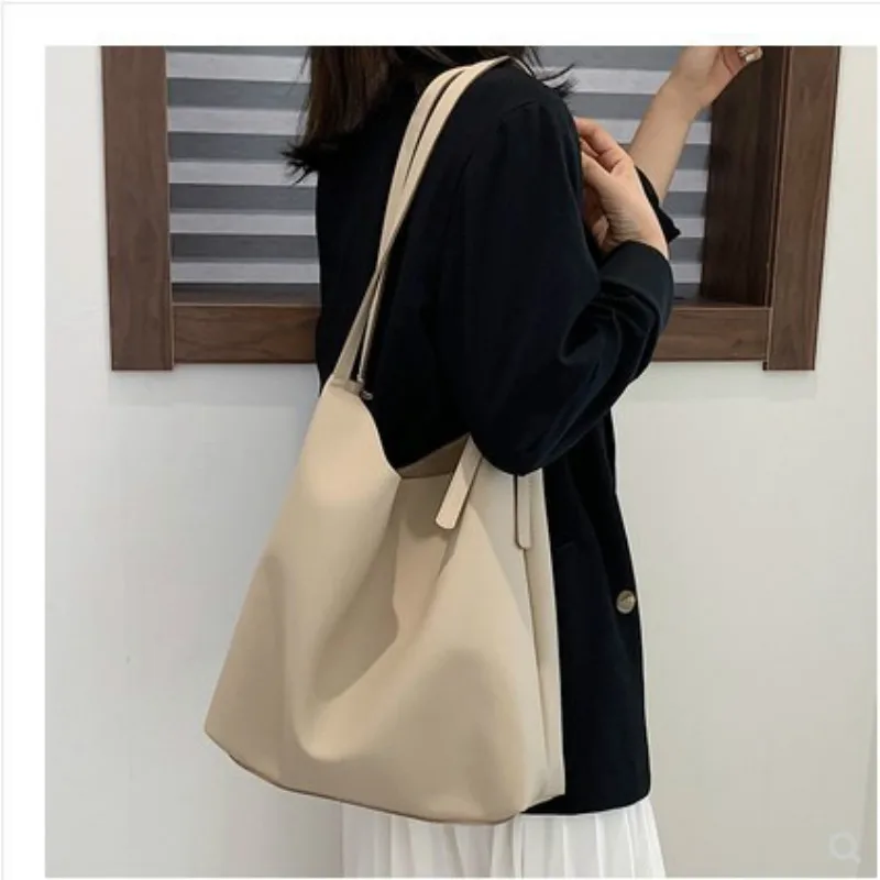 

2020 new Korean simple adjustable solid color single shoulder messenger big bucket mother and daughter bag factory direct sales