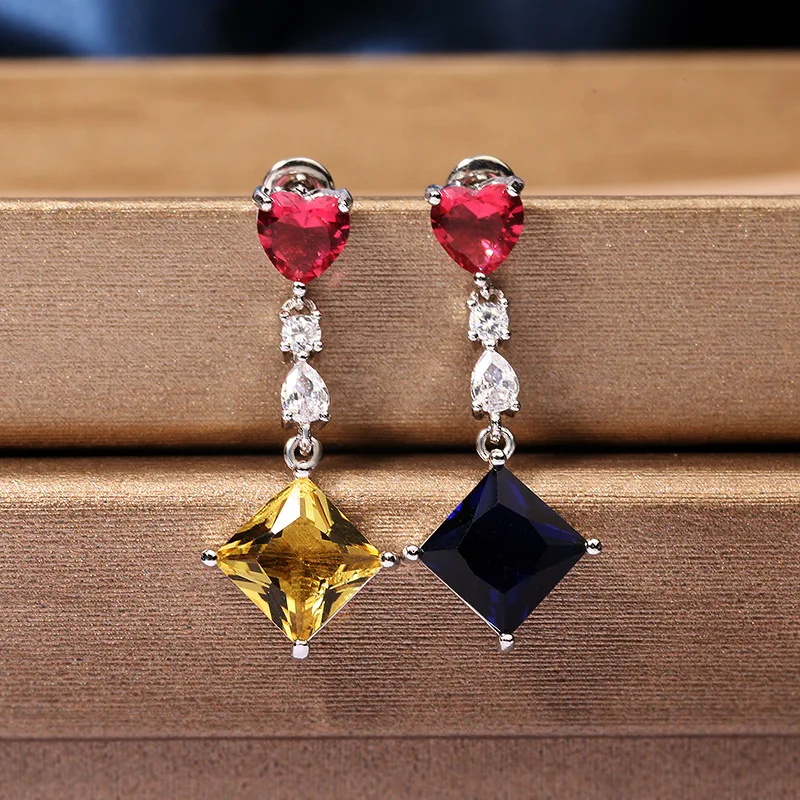 

NPKDS Korean Version of The Fashion Creative Two-color Crystal Asymmetrical Earrings Female Simple Personality Earrings Jewelry