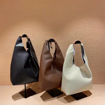

New high quality leather fashion trend personalized leather woven handle net edition women's bag
