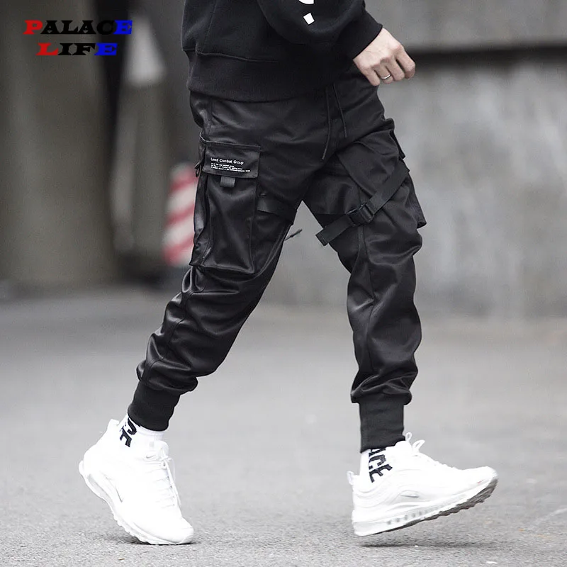 2020 Spring Hip Hop Joggers Men Black Harem Pants Multi-pocket Ribbons Man Sweatpants Streetwear Casual Mens Pants M-5XL 2020 Spring Hip Hop Joggers Men Black Harem Pants Multi-pocket Ribbons Man Sweatpants Streetwear Casual Mens Pants M-5XL