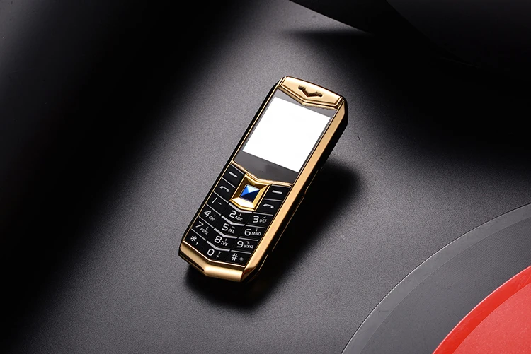 Мини Роскошный металлический корпус телефона с MP3 камерой Bluetooth фонарик детский телефон 1,5 ''мобильные телефоны