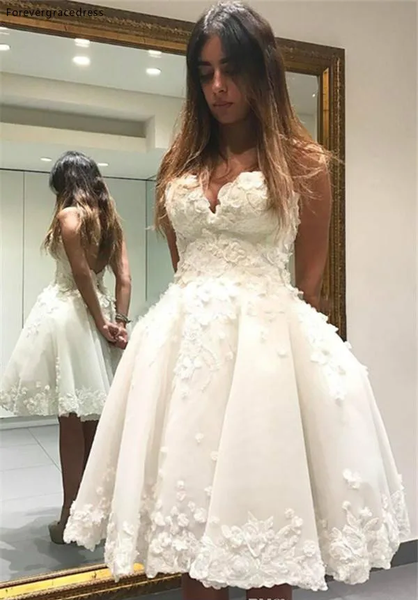 white open back wedding dress