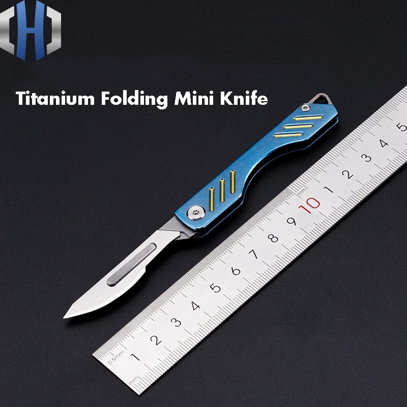 Baratos Mini cuchillo plegable EDC de aleación de titanio 3 colores con 24 hojas * 10 Uds.