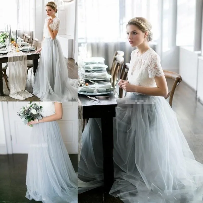 2020 Elegante Dusty Blue Land Strand Trouwjurken Bohemian Lace Korte Mouwen Tule Rokken Goedkope Bruidsjurken Robe de mariee 2020 Elegante Dusty Blue Land Strand Trouwjurken Bohemian Lace Korte Mouwen Tule Rokken Goedkope Bruidsjurken Robe de mariee