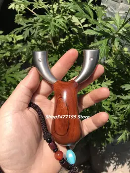 

Small and convenient pocket slingshot titanium alloy tc21 bow head American desert iron handle material high-end slingshot