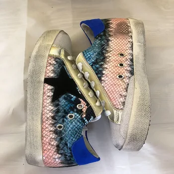 

In 2020 the new small white shoes dirty shoes spring new leather snake fabric plus cowhide couples style strap sneakers