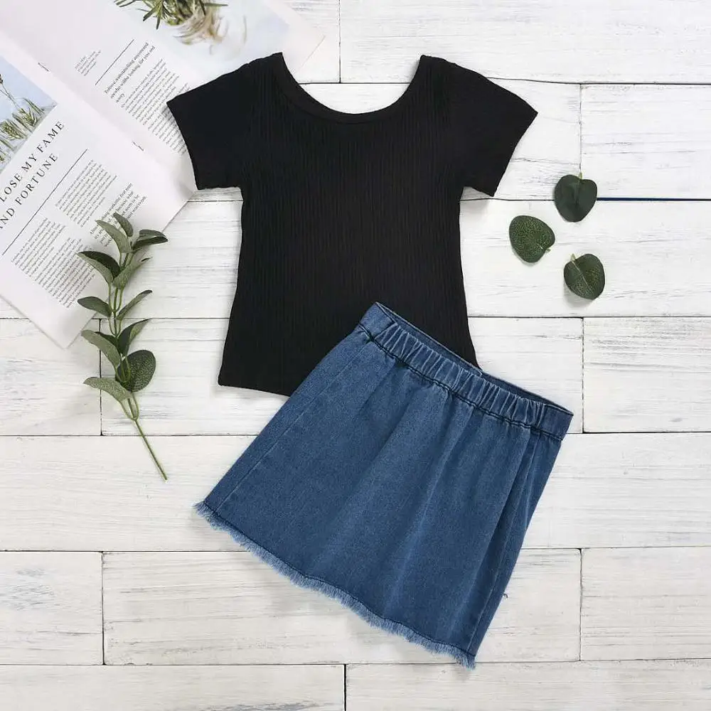 denim skirt with black top