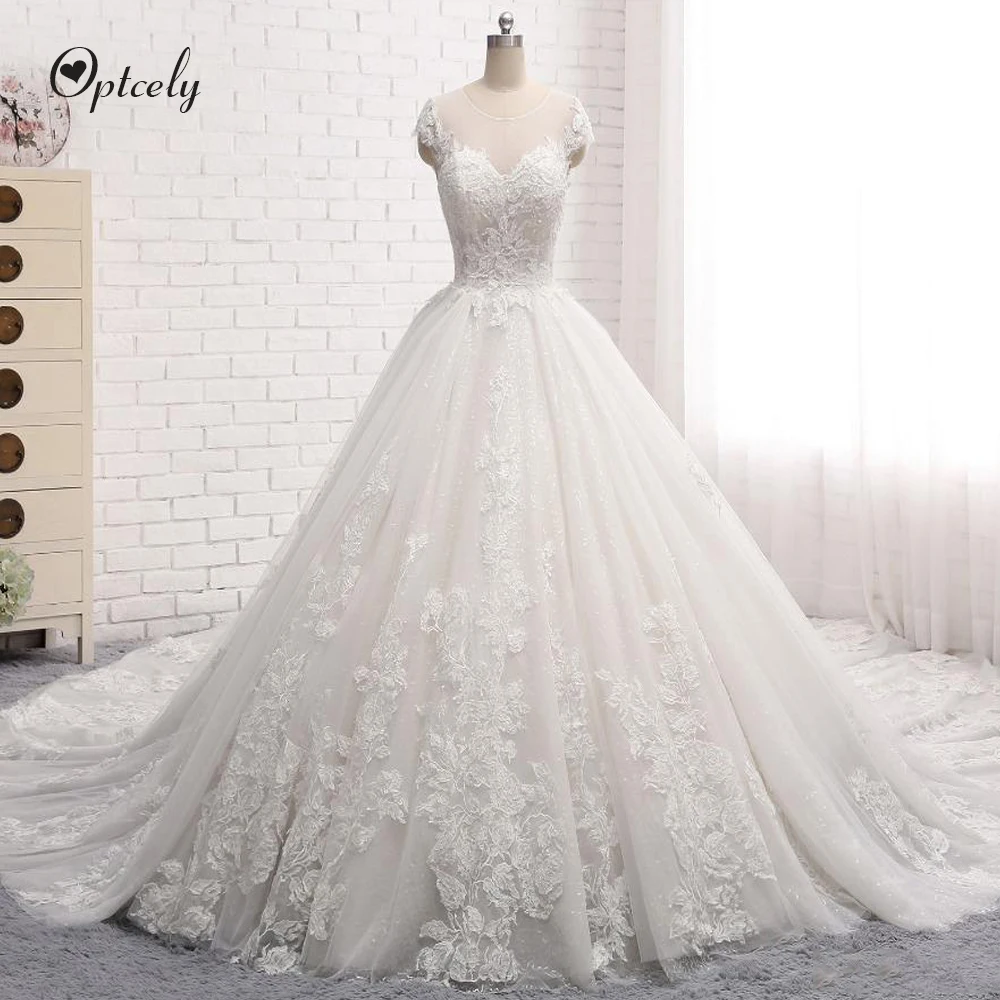 

Optcely Hot Sale Robe De Mariee A-line O-Neck Cap Sleeves Eye-Catching Backless Wedding Dress Appliques Beaded Court Train Gowns